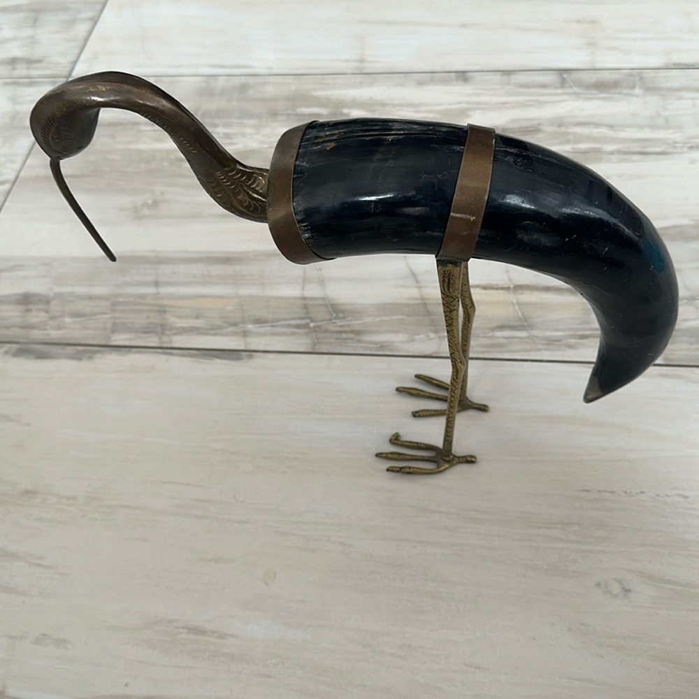 Brass crane with elephant tusk 12 in logX14 in height